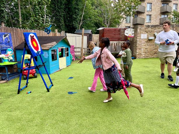 Children playing games together at a church family event