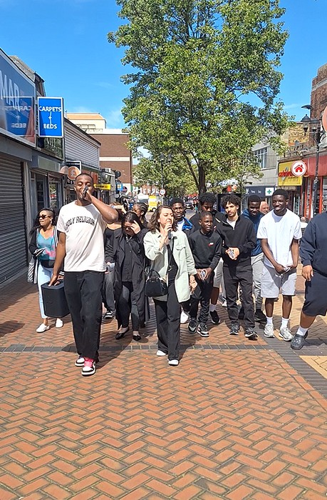 Church members sharing the gospel together on the high street